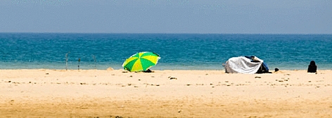 Tourists on the beach and estuary of small river, Cap Serrat, Tunisia.
© WWF-MEDITERRANEAN / E. PARKER rel=