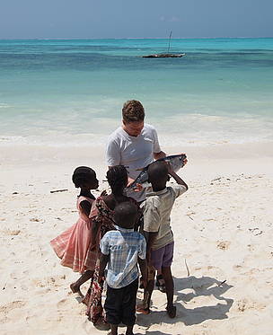 children on the beach. Small-scale fisheries (reef-fish, whitefish and tuna) in Stonetown, Zanzibar, Tanzania © Alfred Schumm WWF International children on the beach. Small-scale fisheries (reef-fish, whitefish and tuna) in Stonetown, Zanzibar, Tanzania