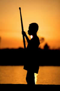 Young boy in traditional dug-out canoe, near Bensbach tourist lodge, as sun sets over the Bensbach ...
© Brent Stirton/Getty Images / WWF-UK
© Brent Stirton/Getty Images / WWF-UK