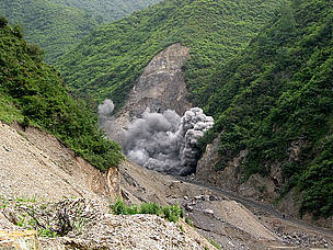 Blasting for a dam near the Wanglang Nature Reserve. Sichuan province, China. Dams developed for ... / ©: Philippe Semanaz Blasting for a dam near the Wanglang Nature Reserve, part of the panda habitat in Sichuan province, ... / ©: Philippe Semanaz