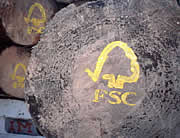 FSC logo on a felled log.