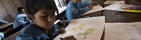 Children at Bachauli school in Chitwan drawing pictures while taking part in Eco Club activities. ...
© Simon de TREY-WHITE / WWF-UK rel=