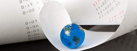 77% of us are living in ecological debt.
© iStockPhoto / Marianne Guntow Adding Machine Tape with Bright Blue Globe rel=