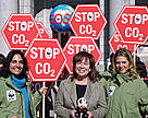 WWF Spain staff meeting Environment Minister Cristina Narbona. 23 STOP signs symbolise the 23 million tons of CO2 WWF Spain demands its industry to cut.