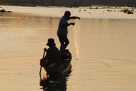 Fishers in the fading evening light on the Cambodian section of the Mekong River.
© Gerard Ryan / WWF-Cambodia rel=