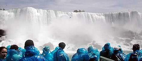 Tourists enjoying the magnificent view of the Niagara Falls.
© Steve & Tanja Tourists enjoying the magnificent view of the Niagara Falls. rel=