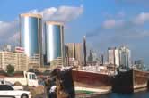 Skyline along the Creek, Dubai, UAE. The second largest of the seven emirates which make up the United Arab Emirates, Dubai is located on the southern shore of the Arabian Gulf. It has an area of some 3,900 square kilometres. Outside the city itself, the emirate is sparsely inhabited and characterised by desert vegetation.
