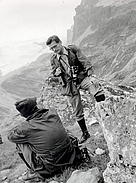 Fritz Vollmar standing on a mountain side.