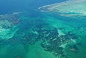 Manombo Bay, Toliara barrier reef, Southwest Madagascar. The true Barrier reef of Toliara is 27km long and 3km wide. Overall the reef system from Toliara to Morombe creates 400km of almost continuing shallow water reef. It is one of the most extensive systems in the Western Indian Ocean region including barrier and fringing reefs which are inhabited by diverse species. Though these reef systems are extensive, they are under enormous pressure from human and natural factors such as overfishing and sedimentation. © Xavier Vincke / WWF Madagascar Manombo Bay, Toliara barrier reef, Southwest Madagascar. The true Barrier reef of Toliara is 27km long and 3km wide. Overall the reef system from Toliara to Morombe creates 400km of almost continuing shallow water reef. It is one of the most extensive systems in the Western Indian Ocean region including barrier and fringing reefs which are inhabited by diverse species. Though these reef systems are extensive, they are under enormous pressure from human and natural factors such as overfishing and sedimentation.