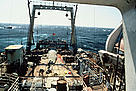 Work deck of a Russian trawler showing a net-load of hake, 100 miles west of Northern California, USA.